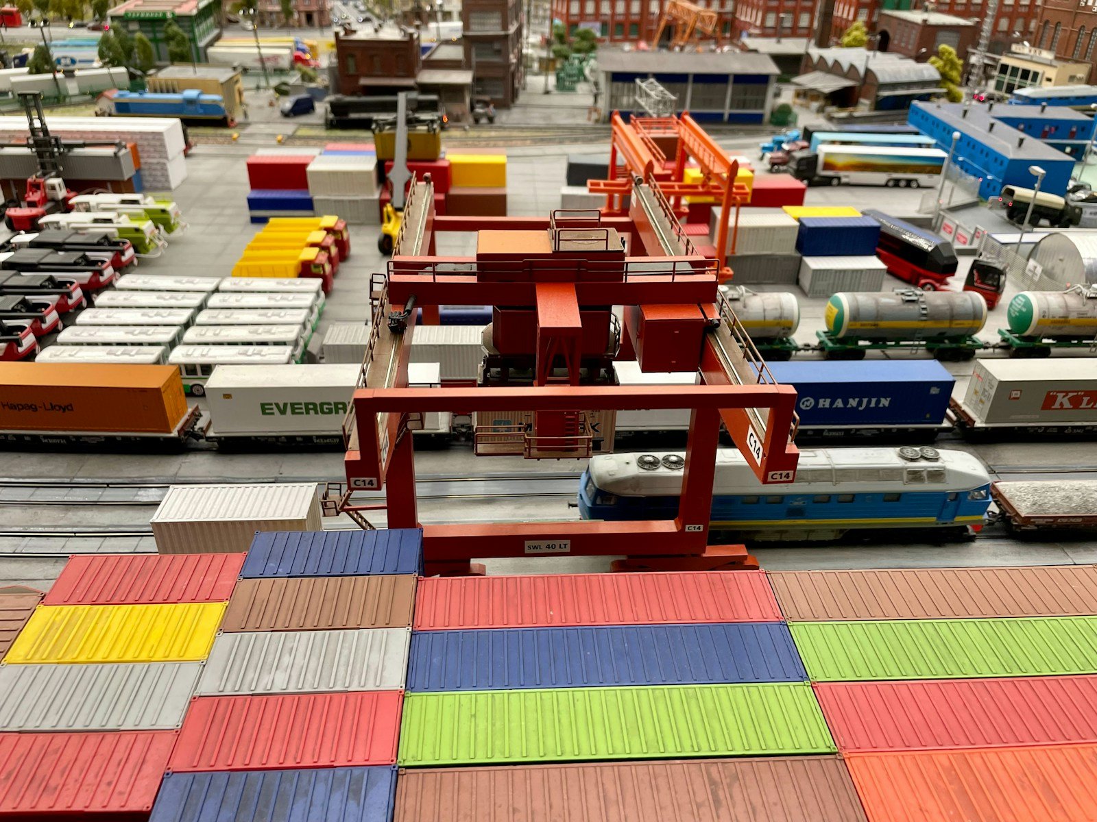 a model train yard with a lot of toy trains